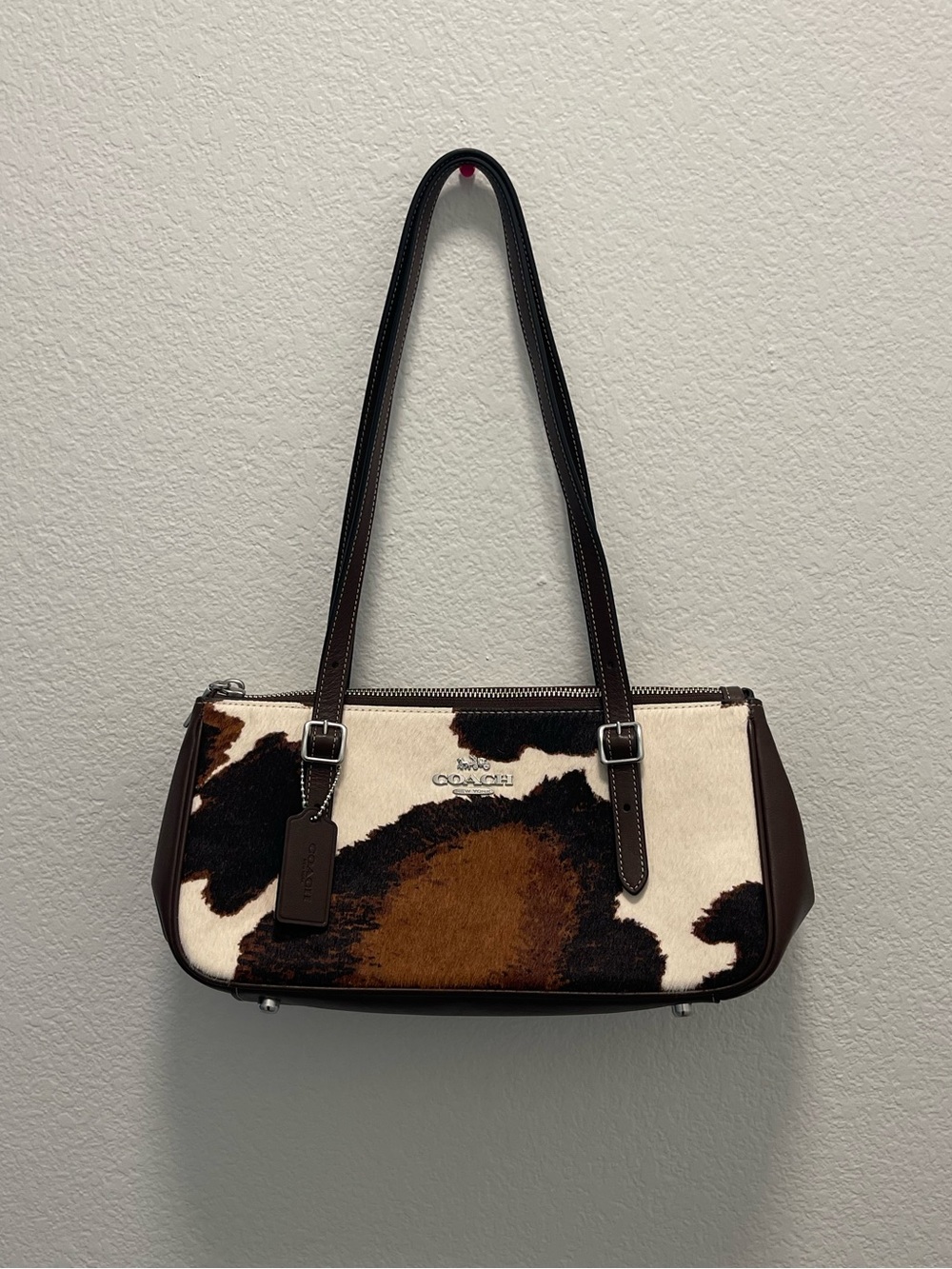 Coach asher cow print